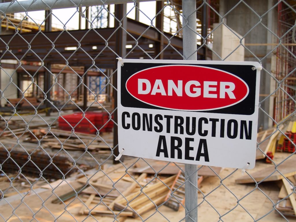 Sign informing people of the danger in the construction area for Temporary Residential Fencing in Rock Hill, SC